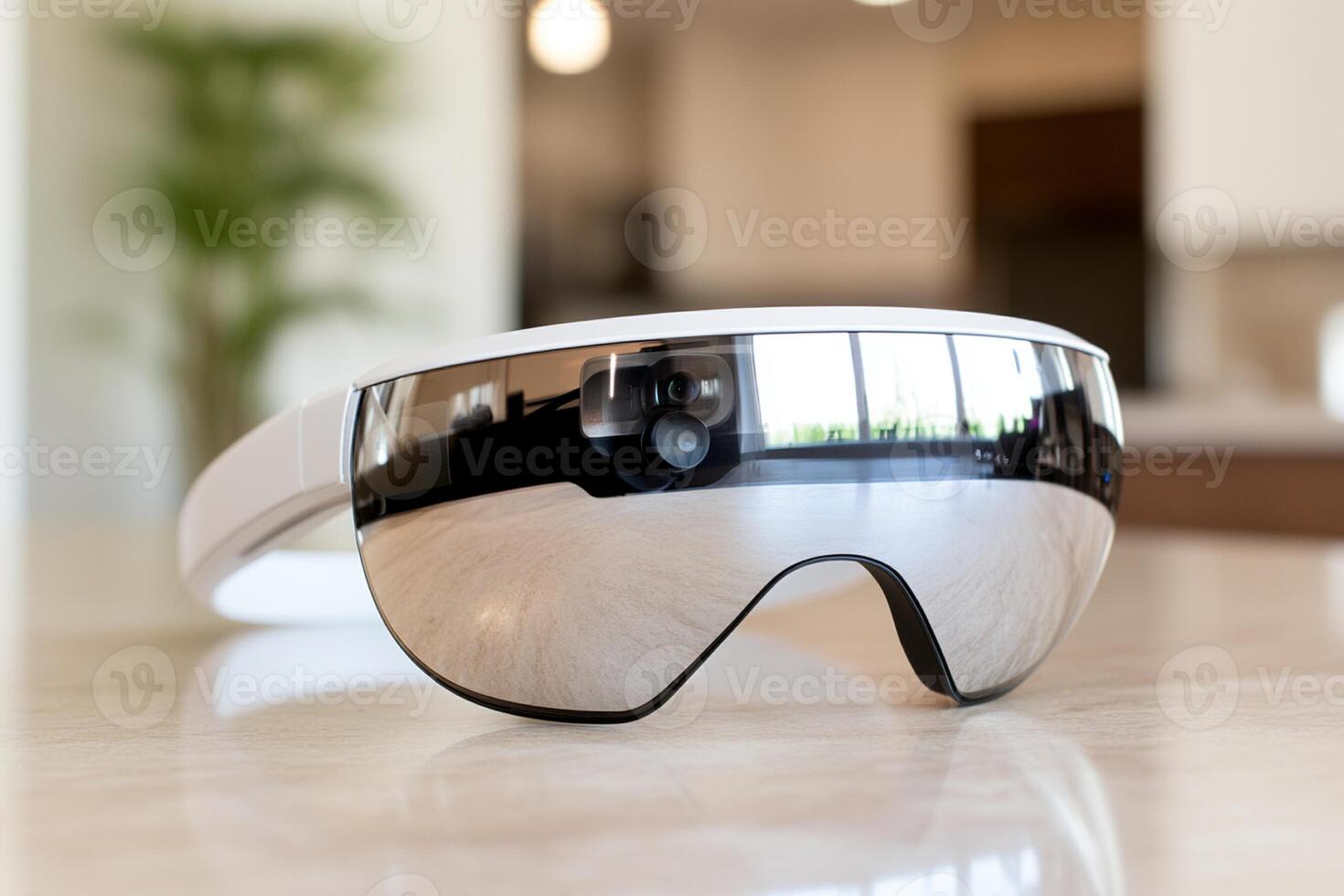 A pair of white goggles with a mirror on the side photo