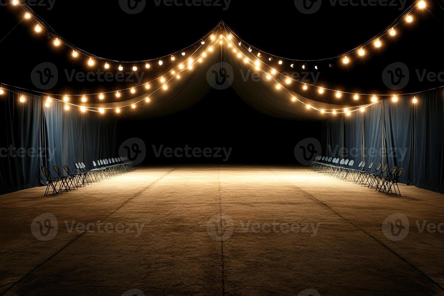 An empty room with blue curtains and chairs photo