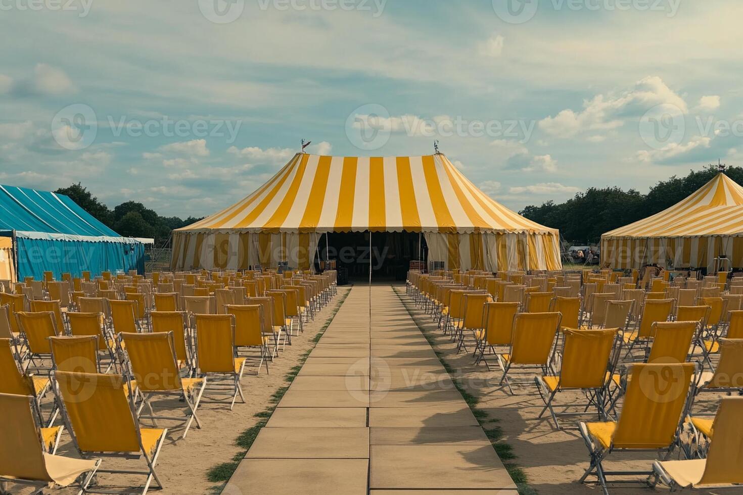 A large tent with yellow and blue chairs photo