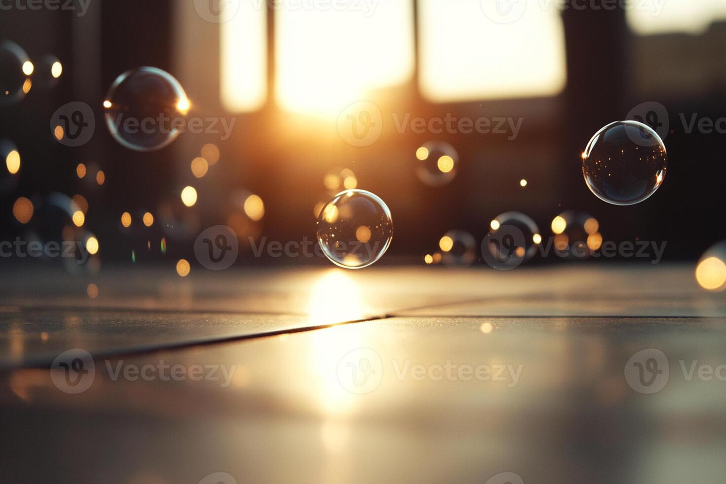 Soap bubbles floating in the air on a tiled floor photo