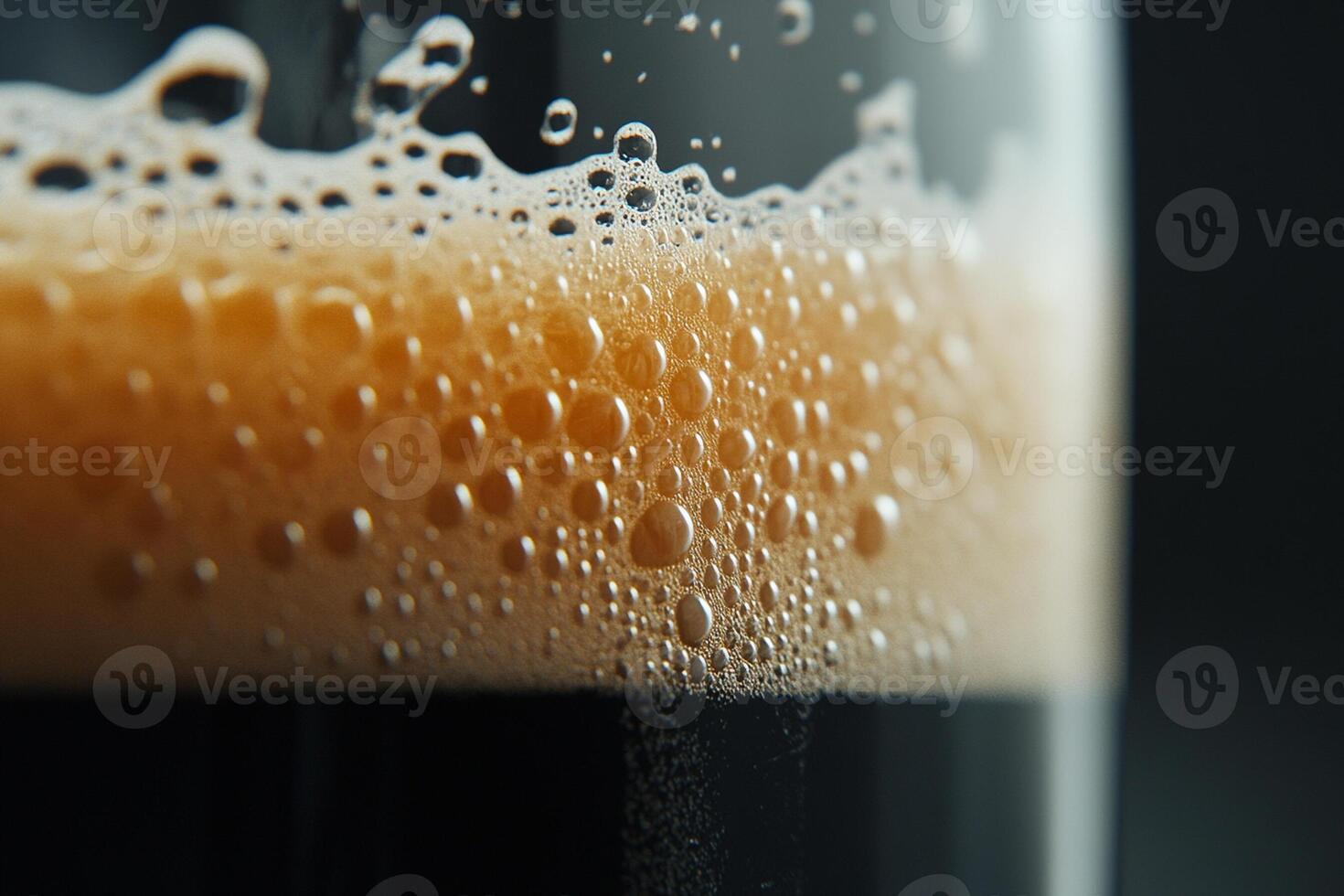 Close up of a glass of beer with bubbles photo
