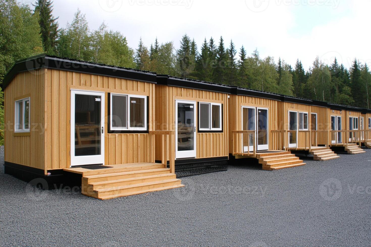A row of small cabins in a parking lot photo