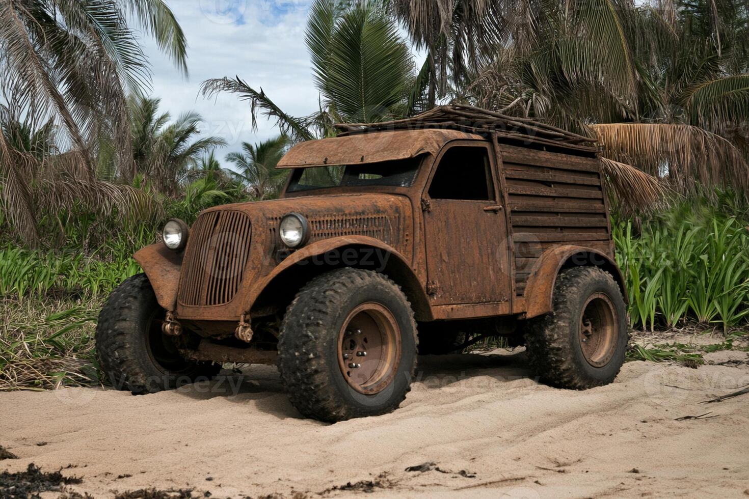 An old rusty truck is parked on the beach photo