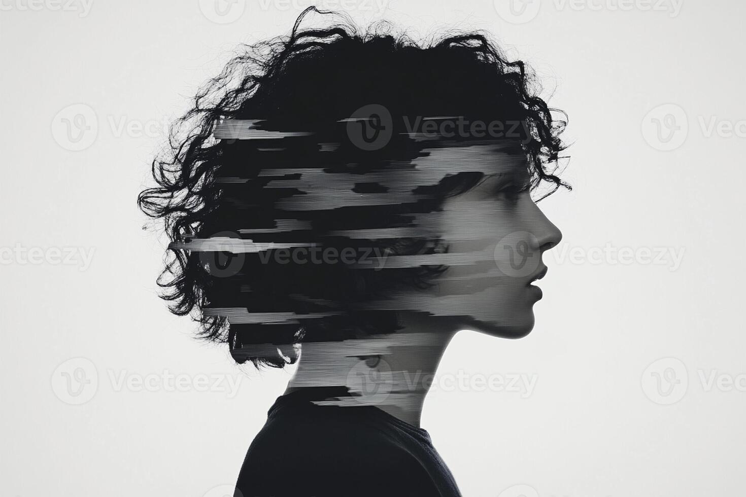 A woman with curly hair and a black shirt photo