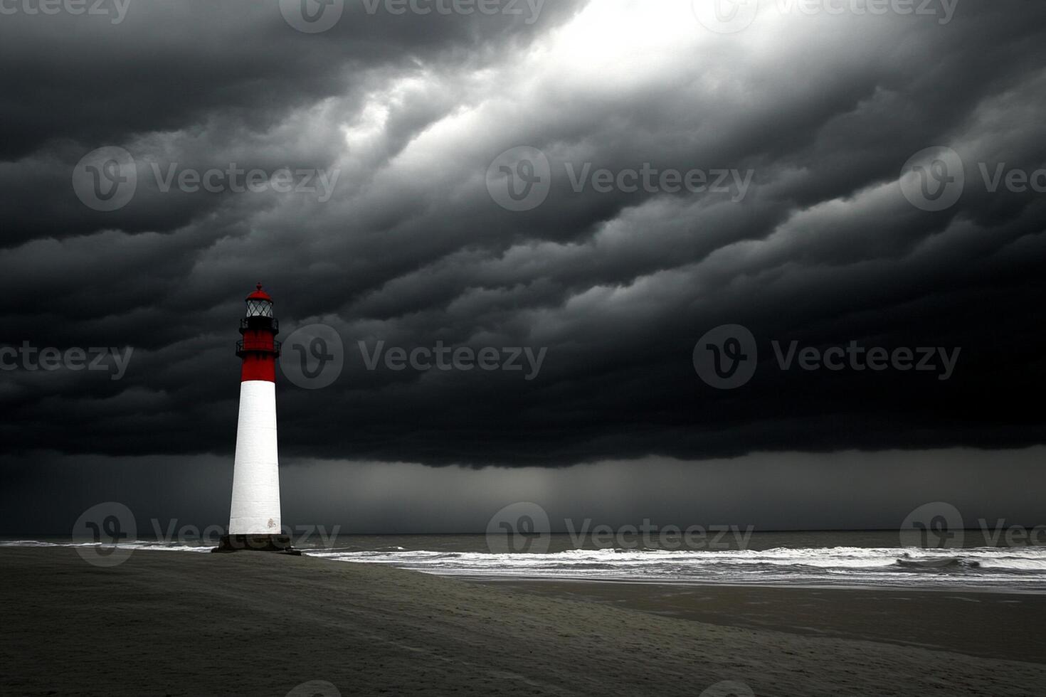 A lighthouse is under a dark stormy sky photo