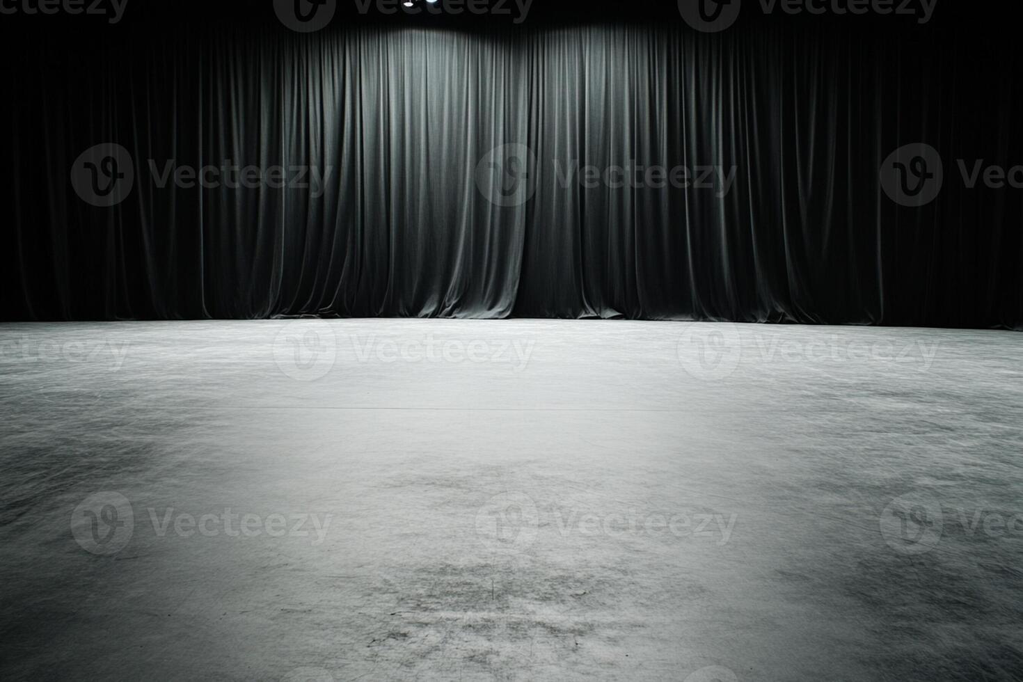 Empty stage with black curtains and spotlight photo