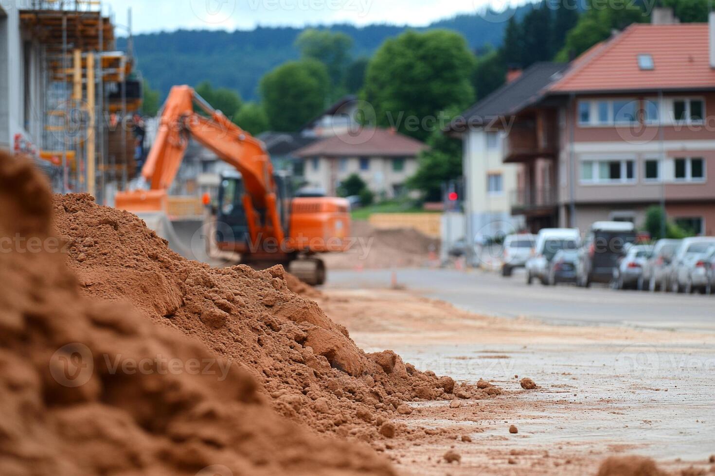 A pile of dirt in front of a construction site photo