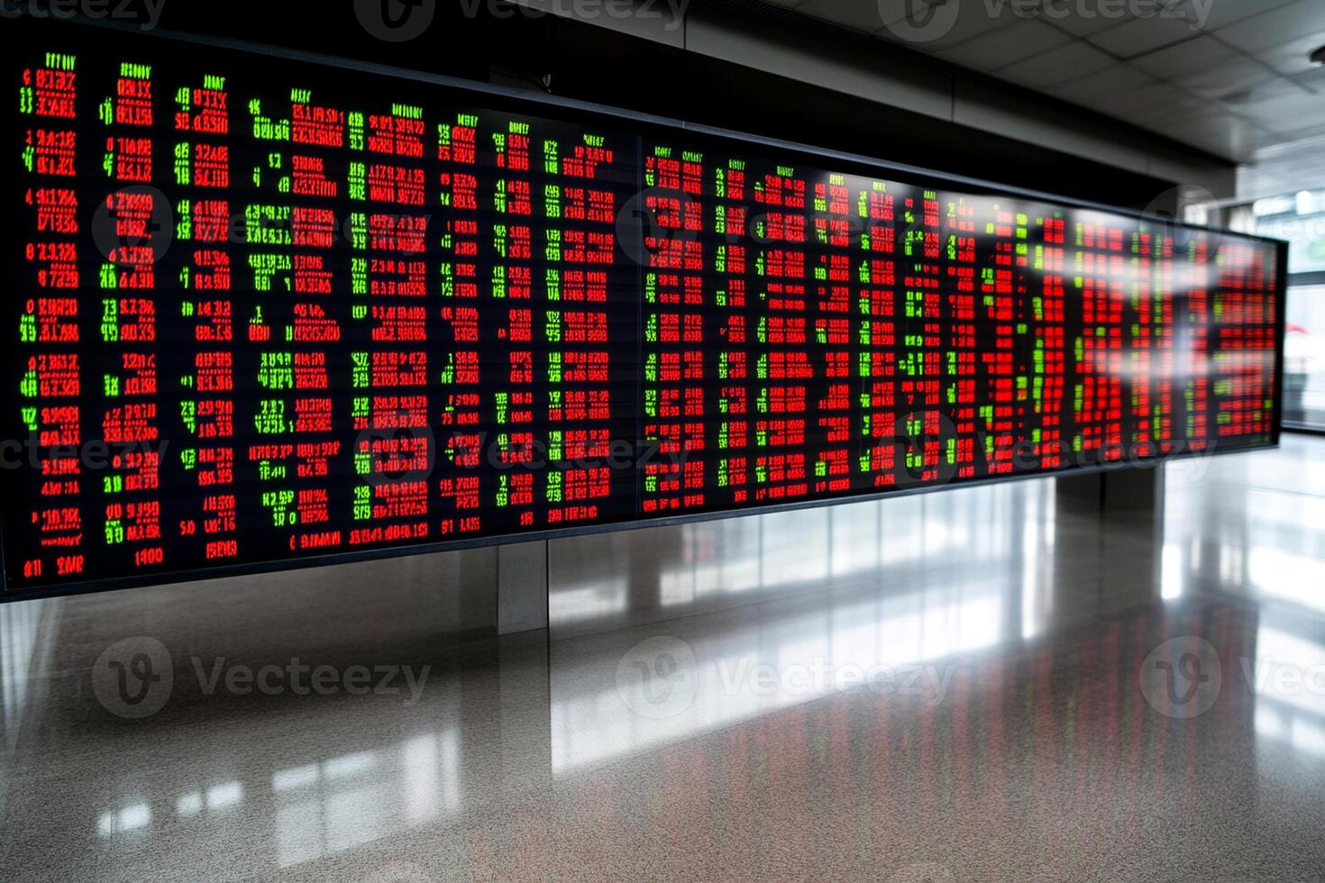 A large screen showing stock prices photo