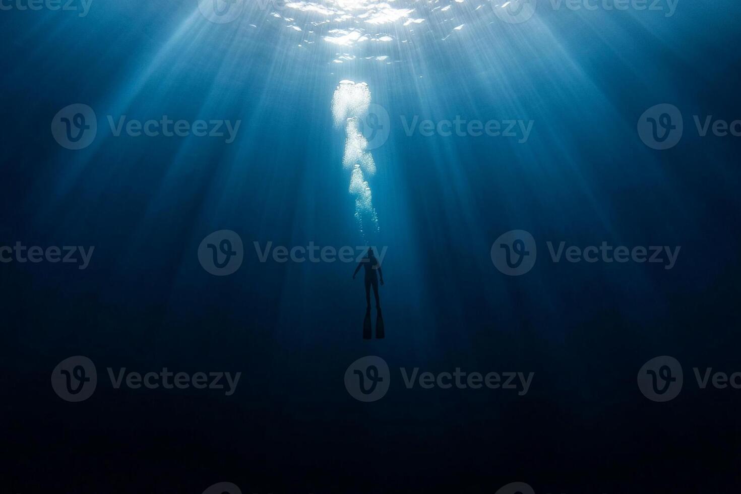 A person in the water with a scuba mask photo