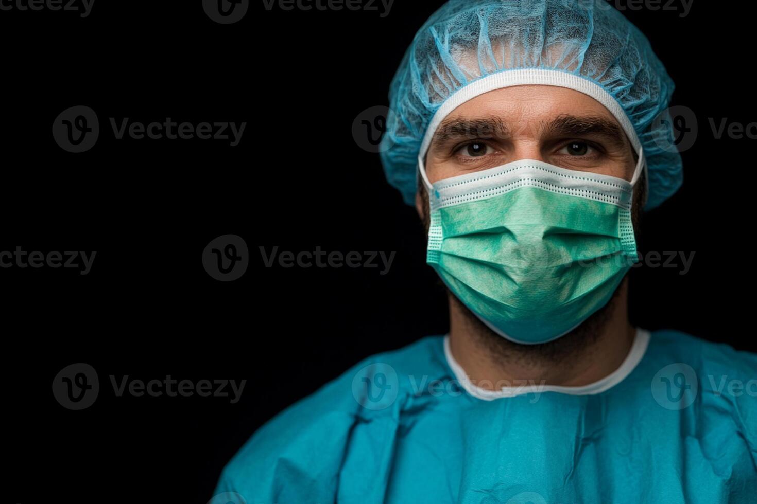 A man in a surgical mask and scrub suit photo