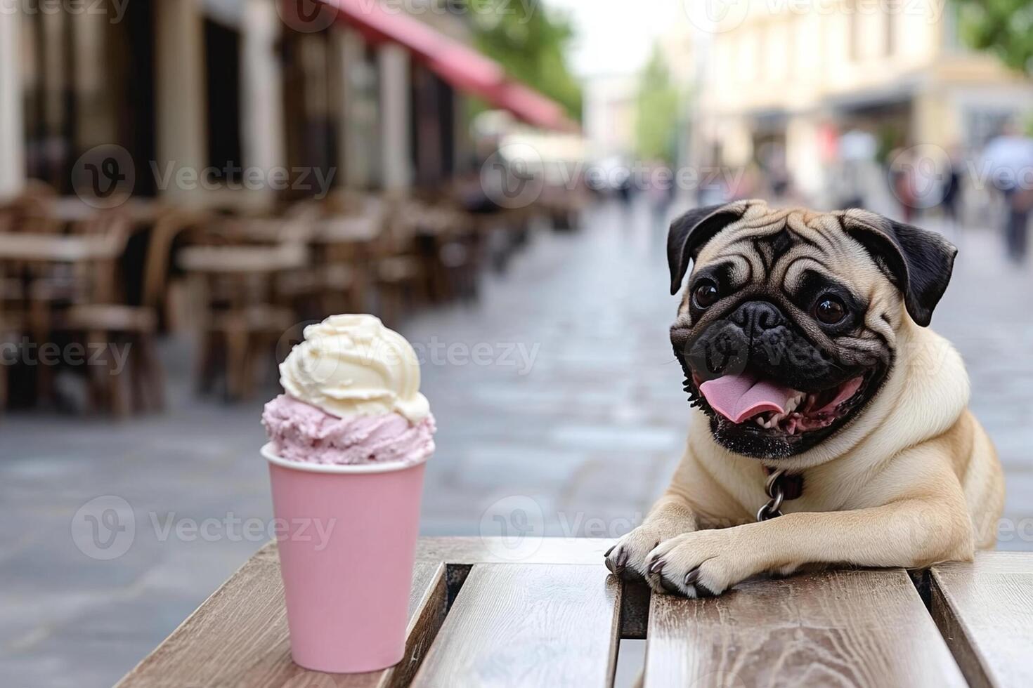 A pug dog sitting at a table with a pink ice cream photo