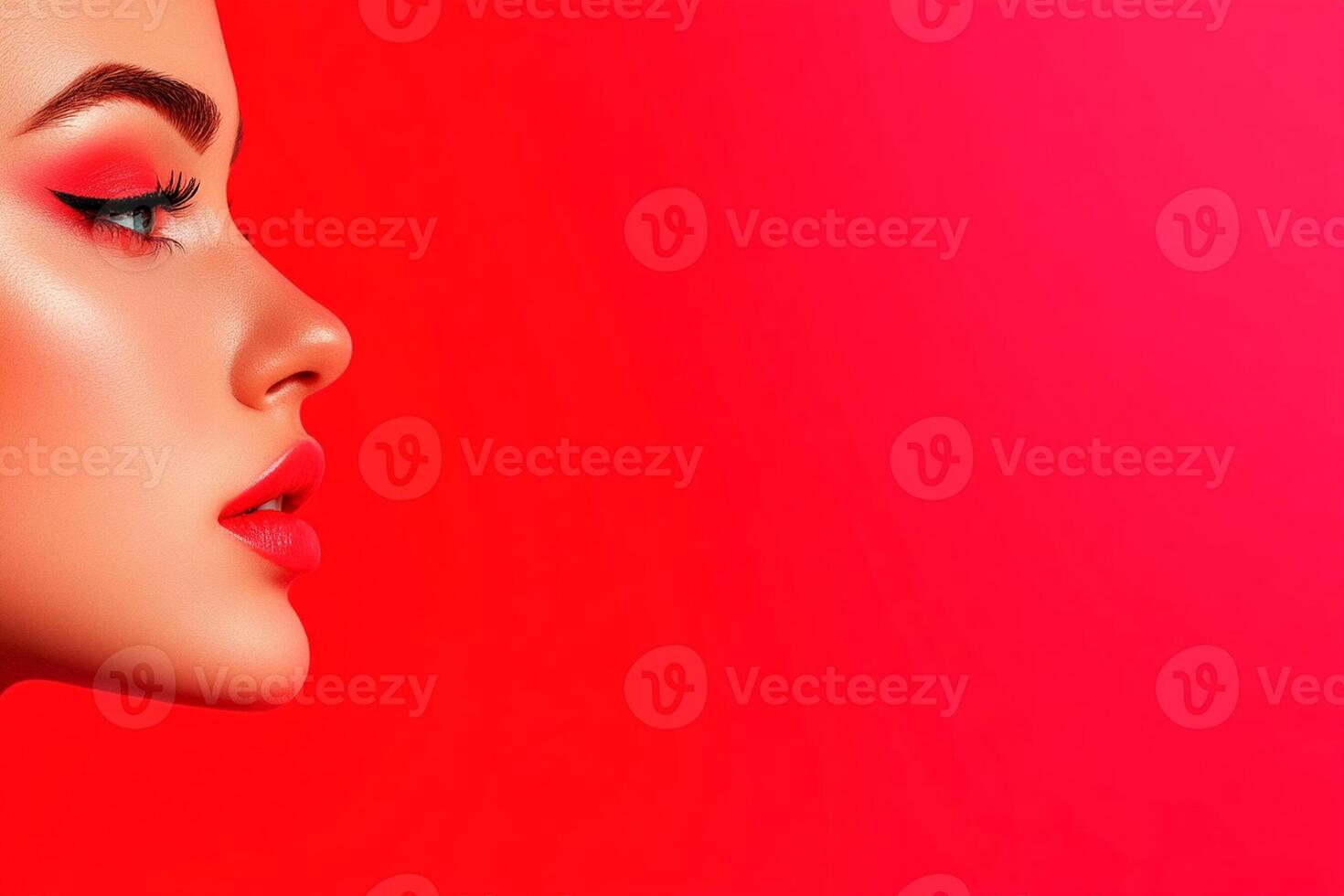 Beautiful woman with bright makeup and red background photo