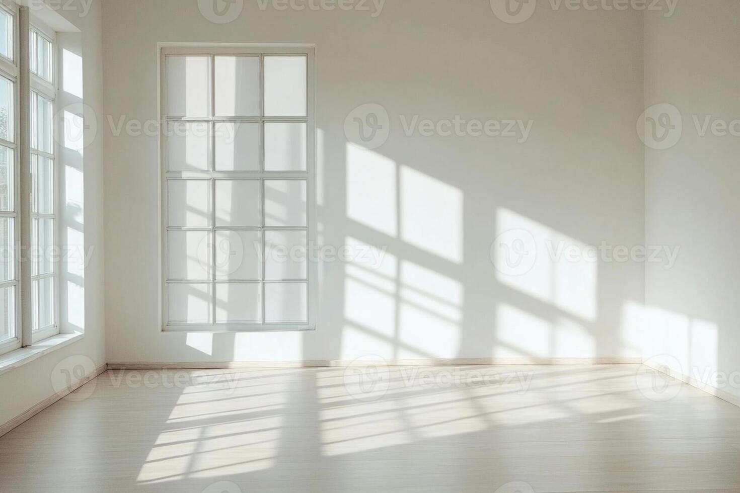 Empty room with sunlight streaming through the windows photo