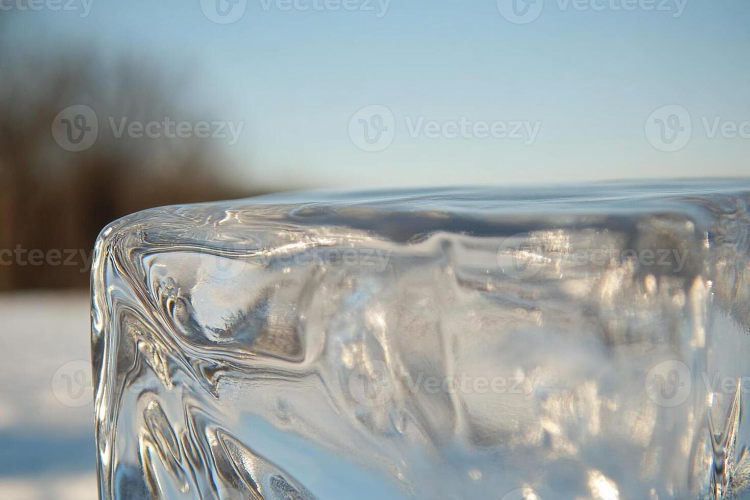 Ice cube on the ground photo