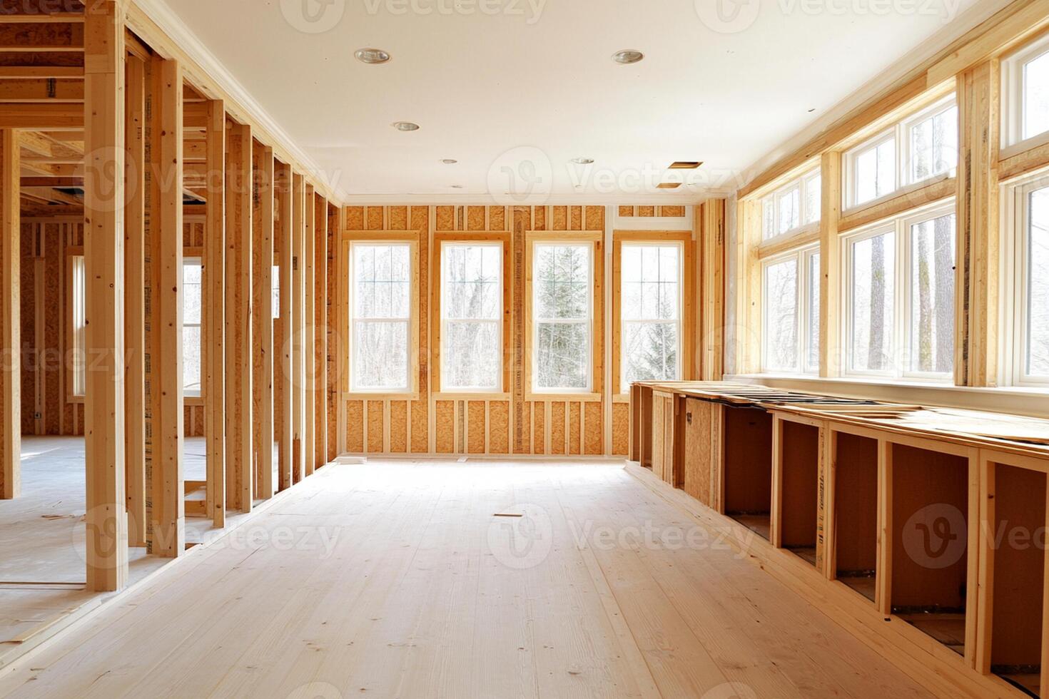 A room with wood framing and windows photo