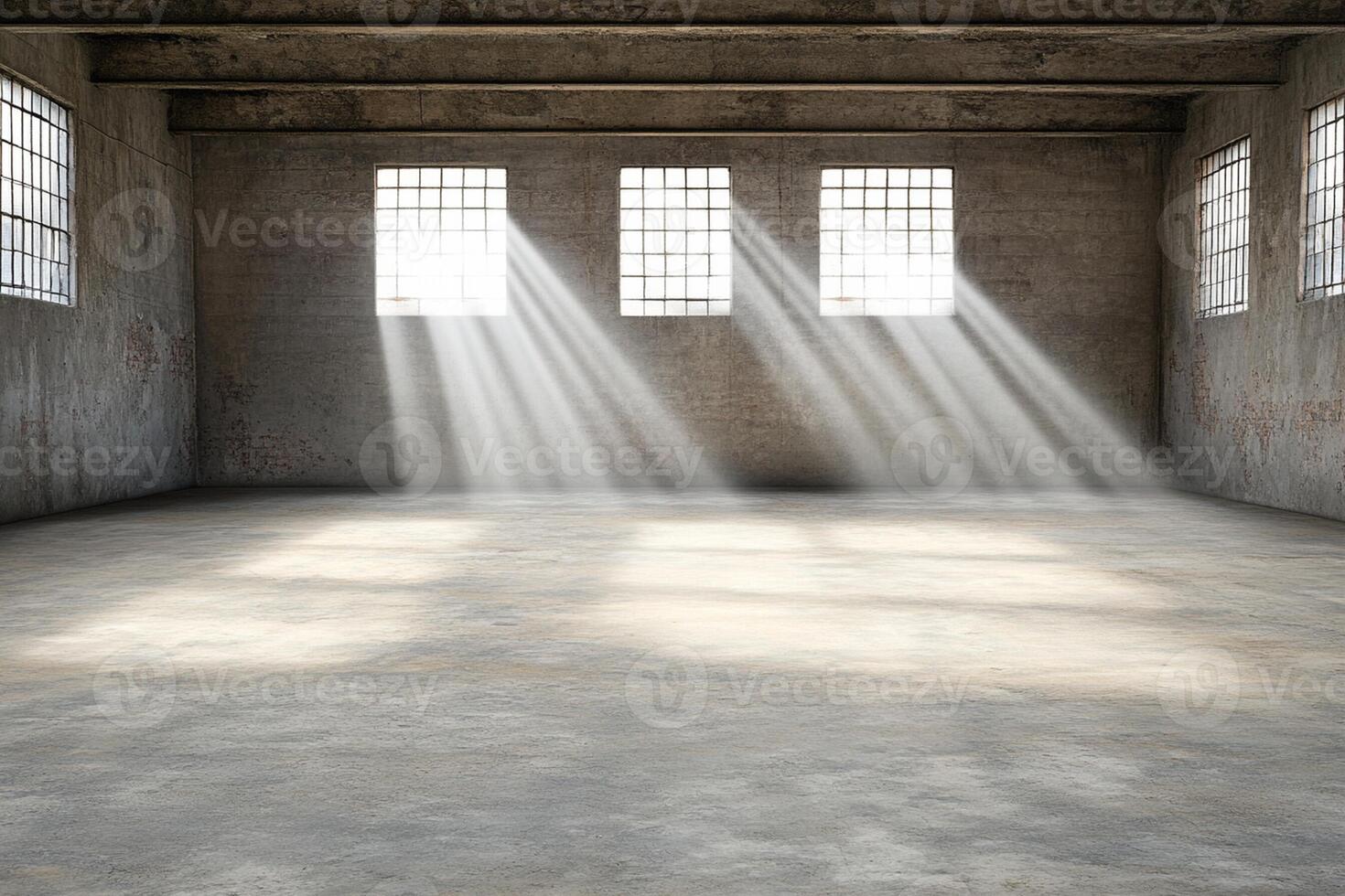 An empty room with sunlight streaming through the windows photo