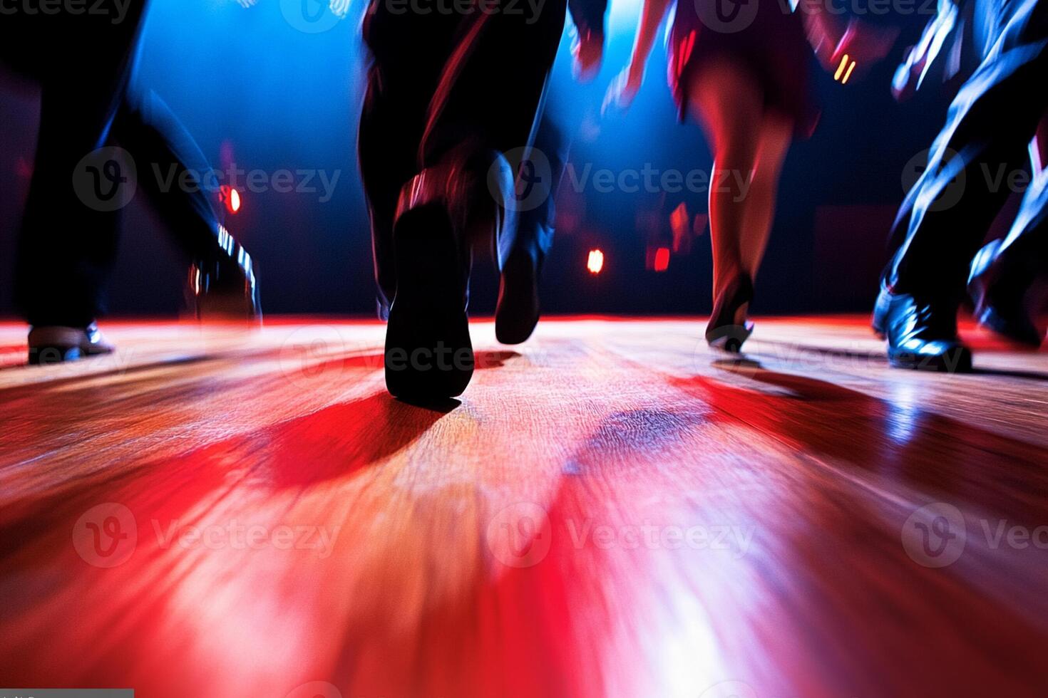 People dancing on a dance floor photo