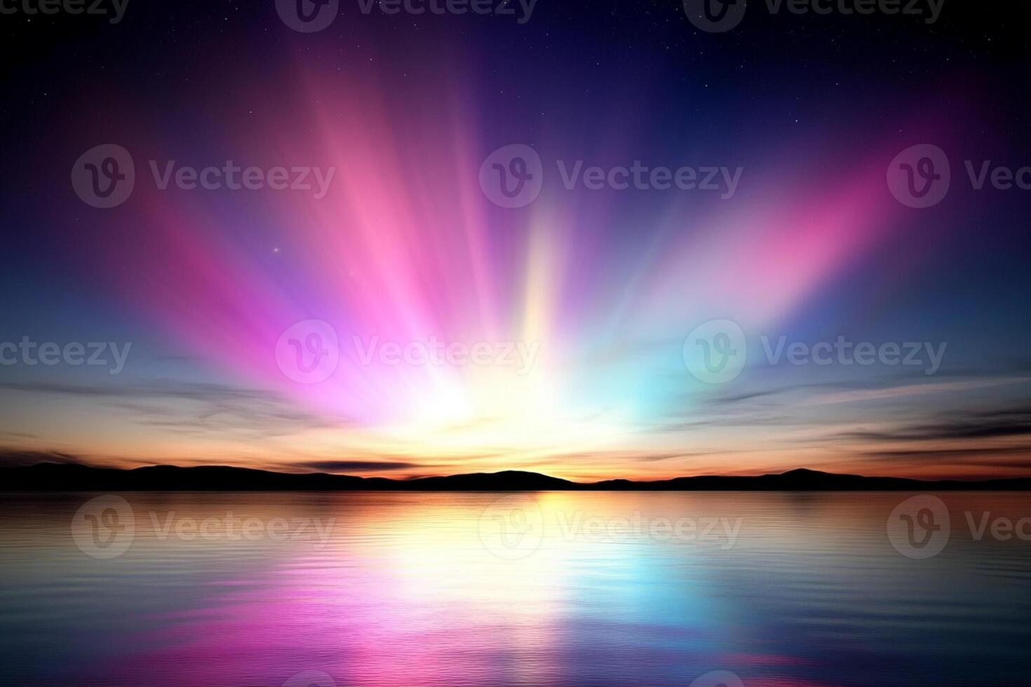 A colorful aurora borealis over the water photo