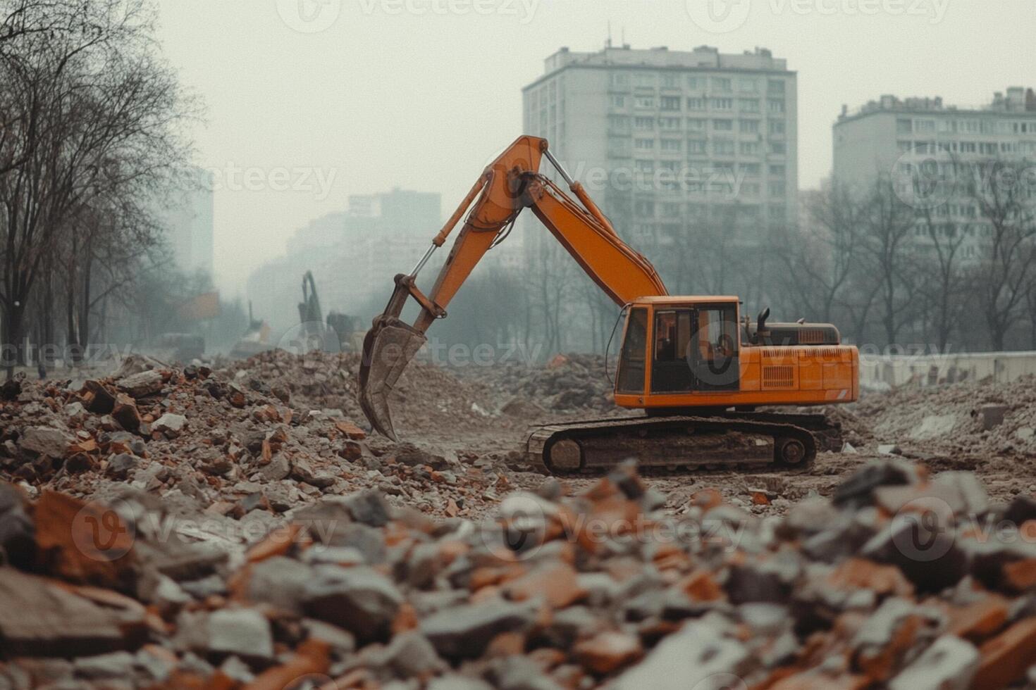 A construction machine is digging through rubble photo