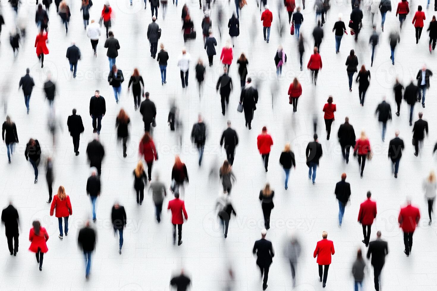 A large group of people walking in a large crowd photo