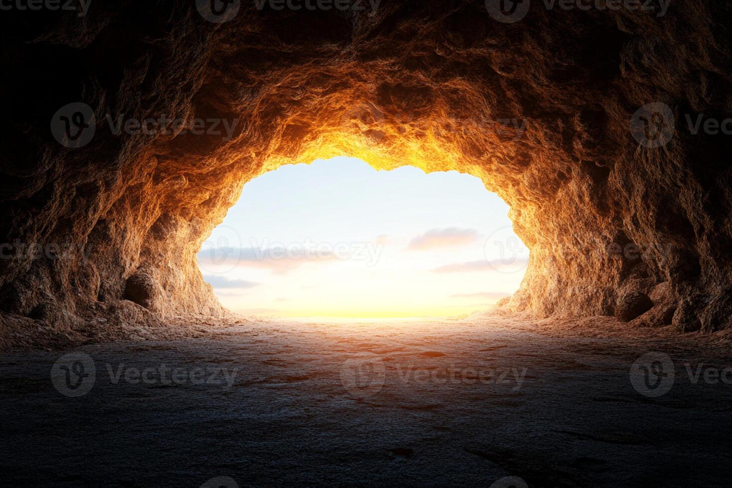 A cave with a light coming out of it at sunset photo