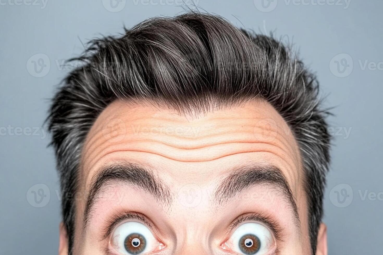A man with a shocked expression on his face photo