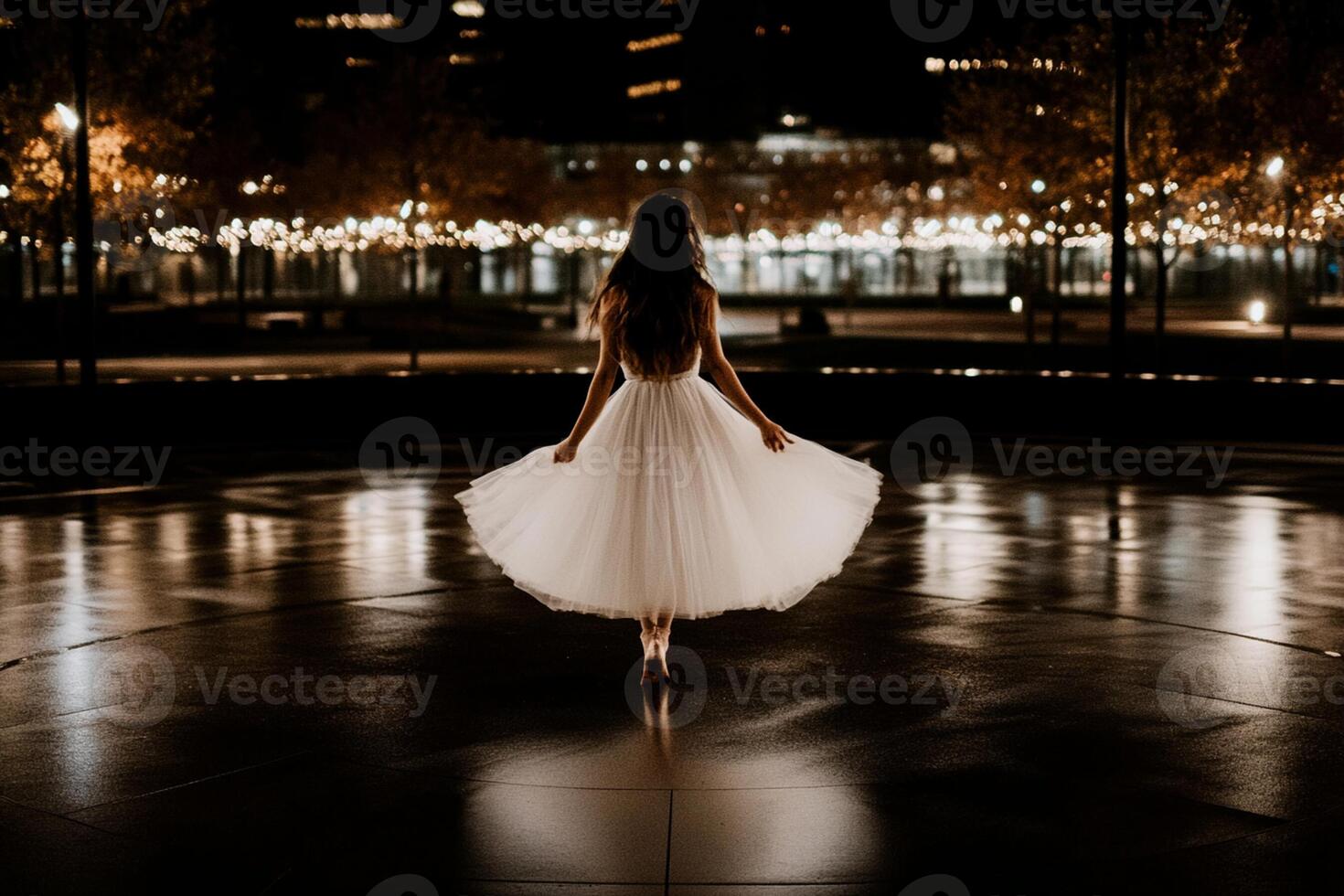 A woman in a white dress is walking in the dark photo