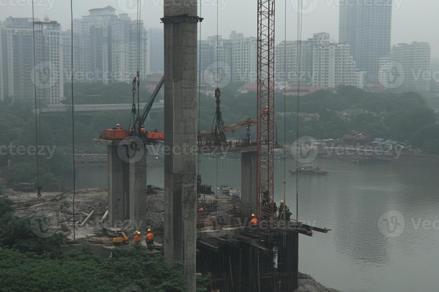 A construction site with a crane and a building photo