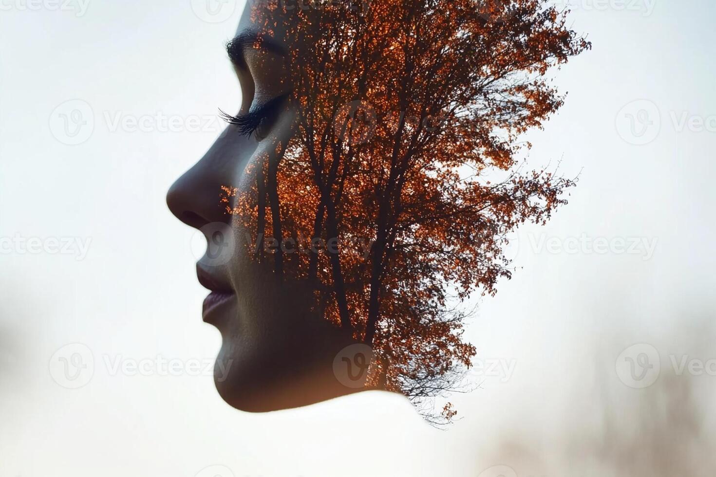 A woman's face is shown with a tree in the background photo