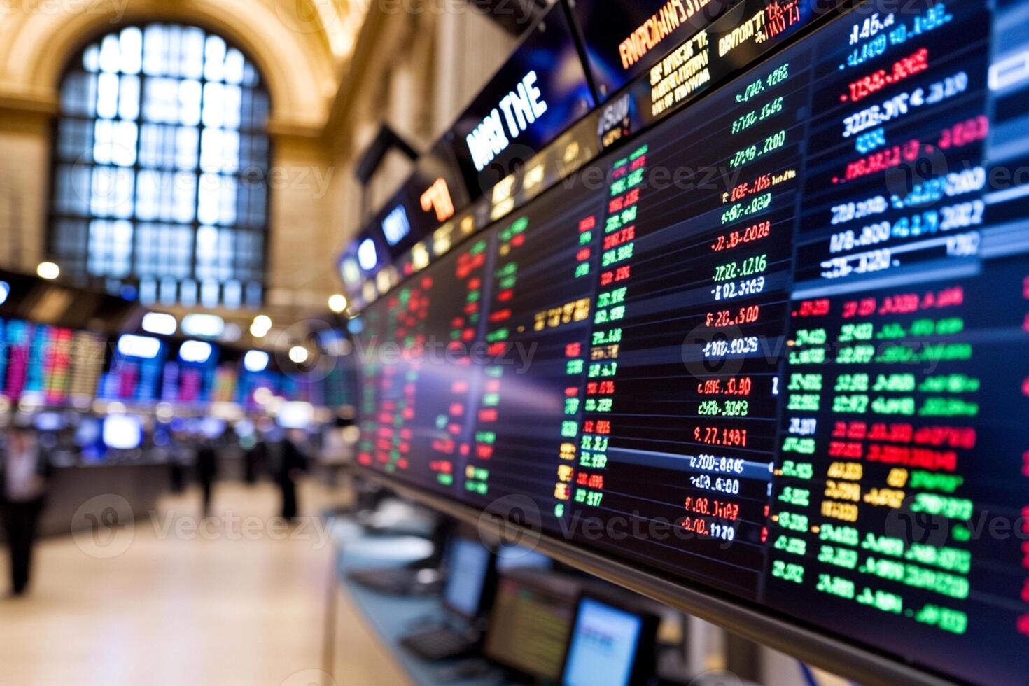 Stock market trading screens in a large building photo