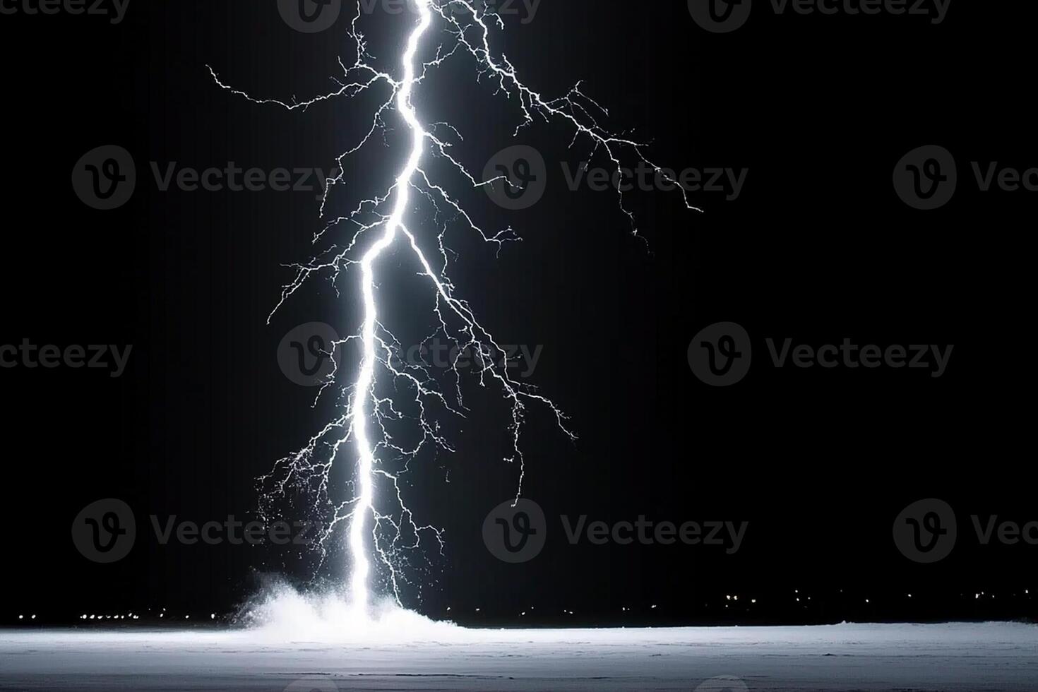 A lightning bolt is seen in the dark sky photo