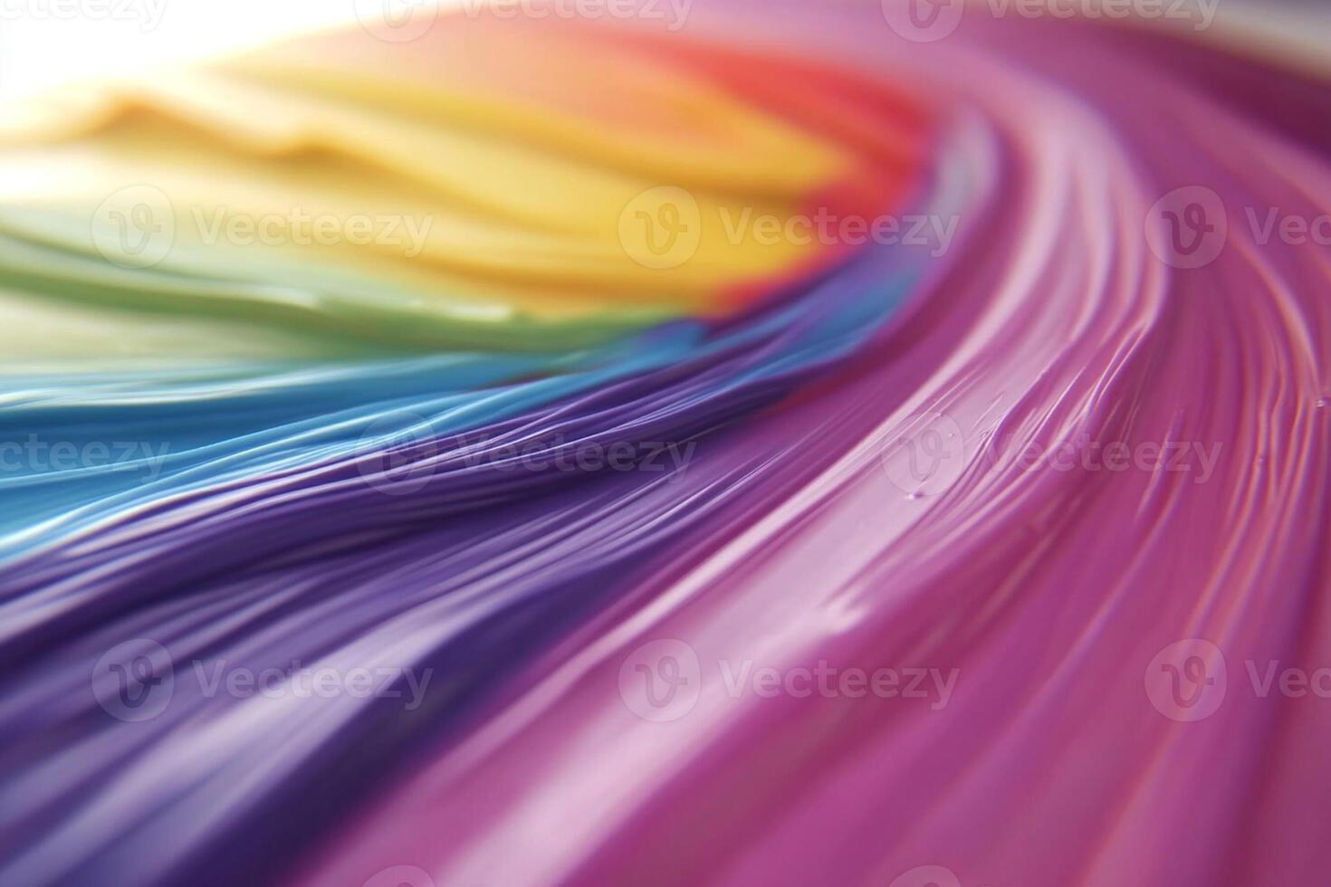 A close up of a rainbow colored paint photo
