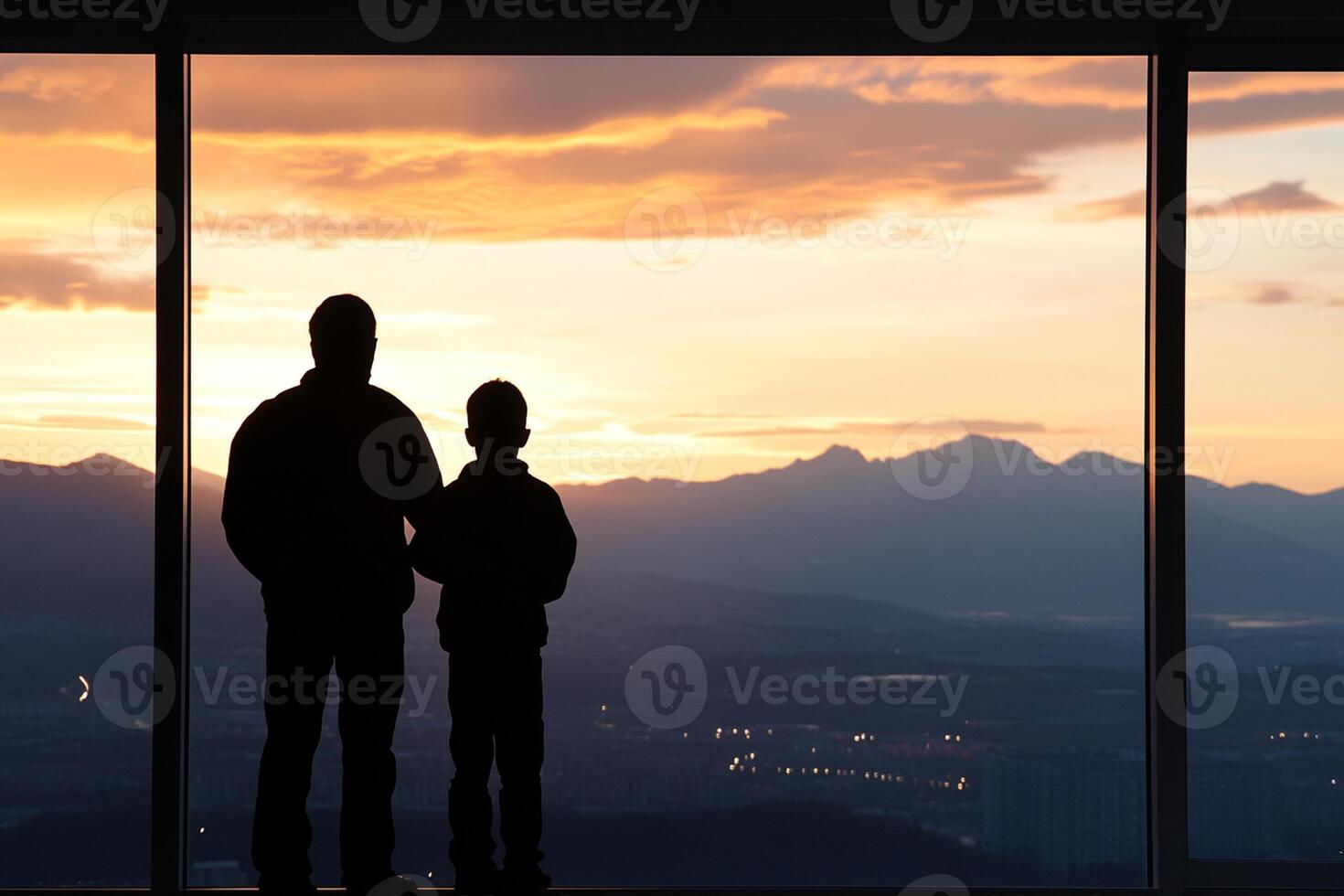 A man and a boy standing in front of a window photo