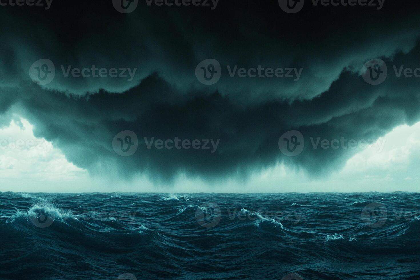 A stormy ocean with dark clouds over it photo