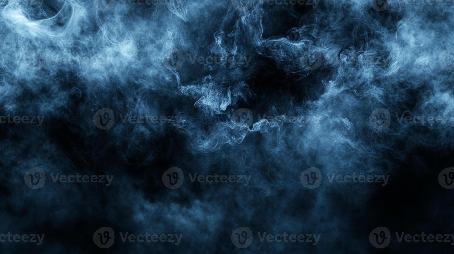 Mysterious blue smoke swirling in darkness creates an ethereal atmosphere and captivating visual effects in a dramatic setting photo