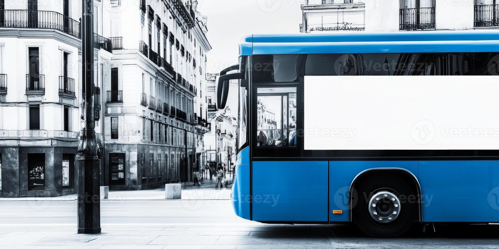 Blue city bus parked on a street in an urban area during daylight hours photo