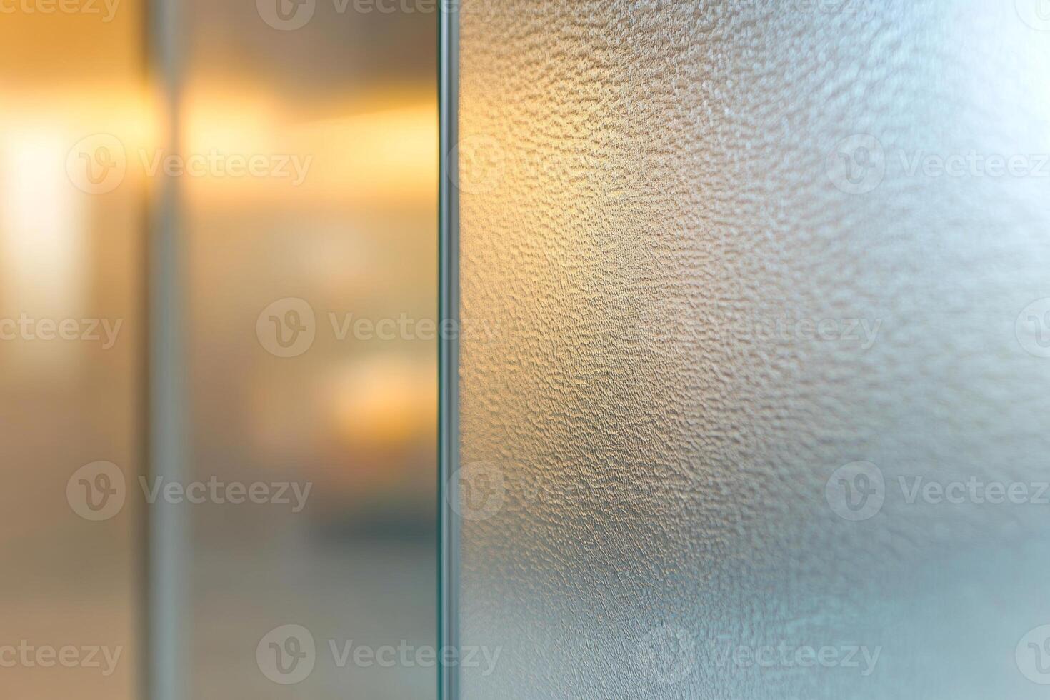 Frosted glass texture with a warm glow in the background creating a serene atmosphere for interior spaces photo