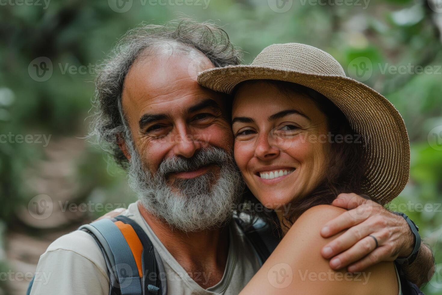 Couple in hiking gear joyfully embracing in peaceful forest trails, enjoying nature and each other's company photo