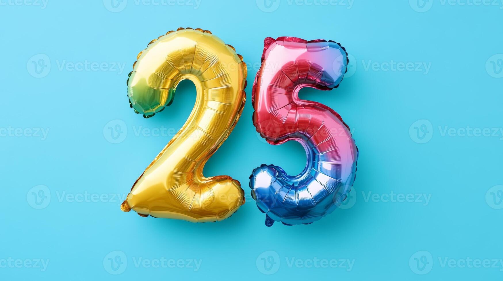 Bright rainbow foil balloon displaying the number twenty-five, viewed from above against a vibrant blue background, perfect for celebrations photo