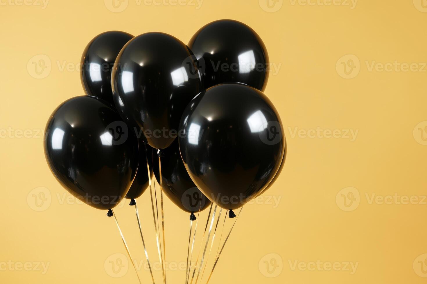 Black balloons with discounts on a vibrant gold background create an eye-catching display suitable for various occasions photo