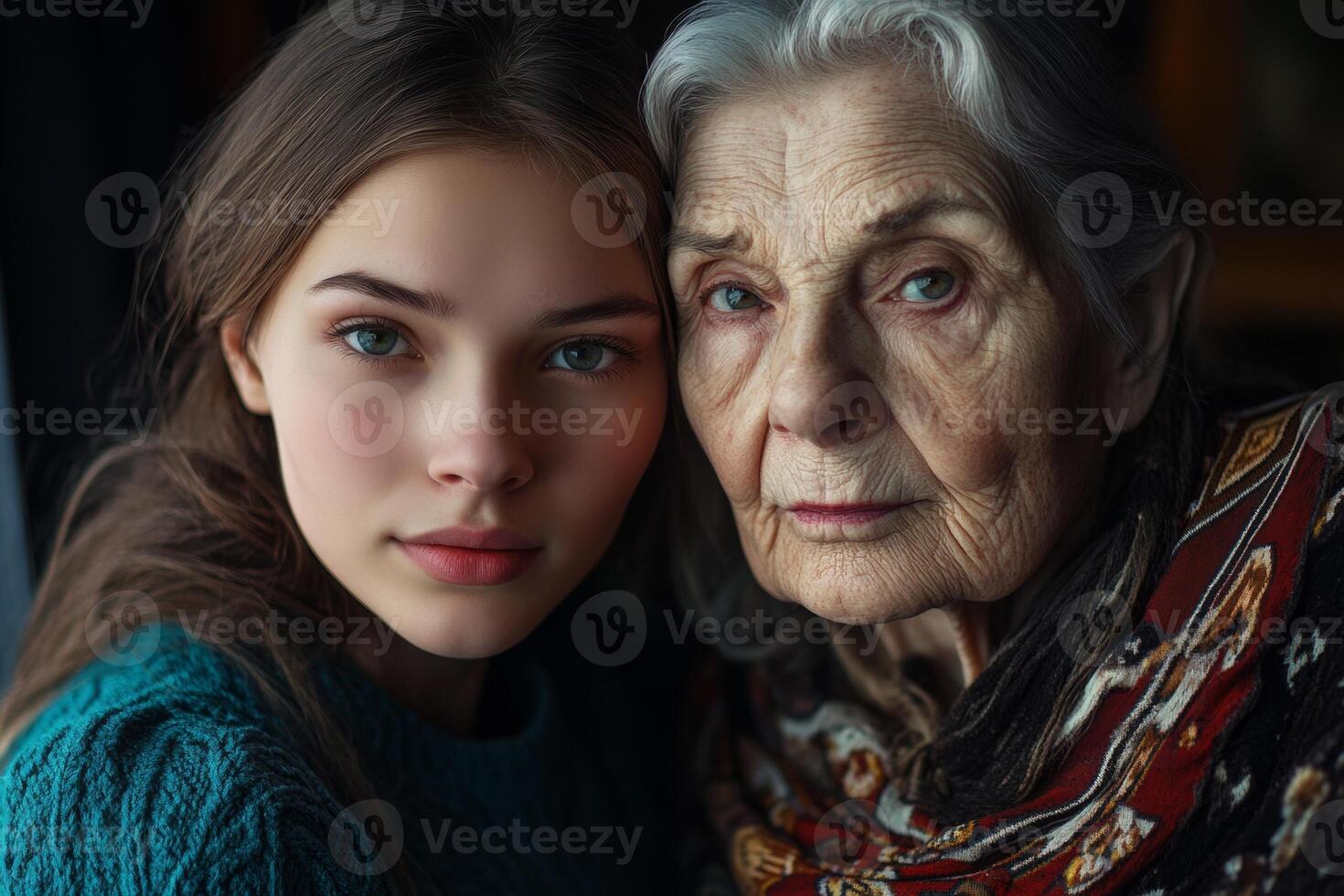 Portrait of a young woman and an elderly woman showcasing the bond across generations in a cozy indoor setting during the afternoon photo