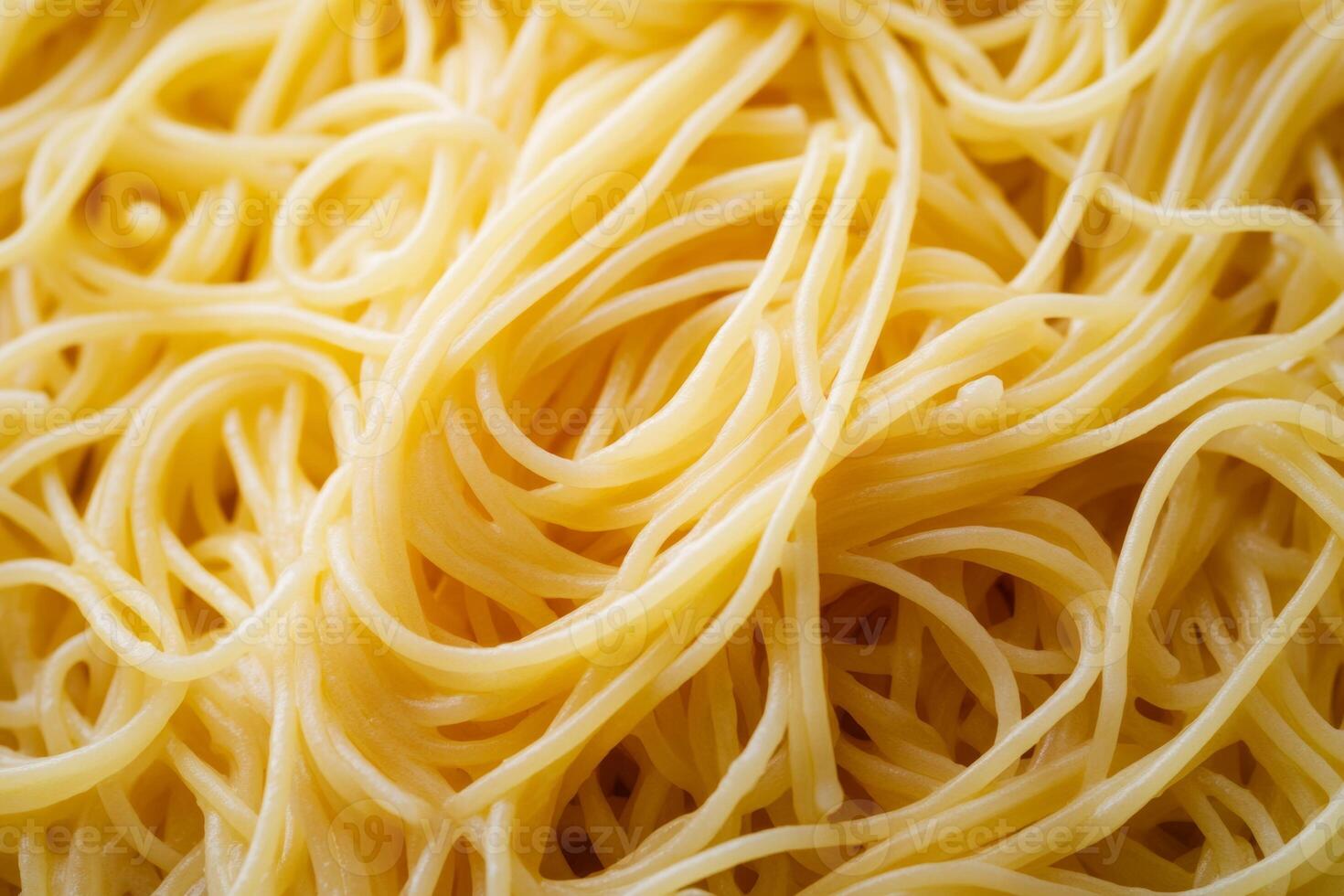 Freshly prepared spaghetti served on a plate with ample room for additional toppings in a cozy kitchen setting photo
