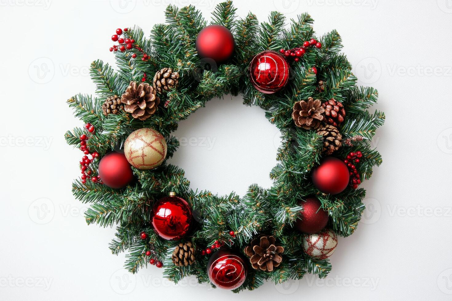 Elegant close-up of a festive Christmas wreath adorned with shiny ornaments and pinecones, perfect for seasonal decor photo