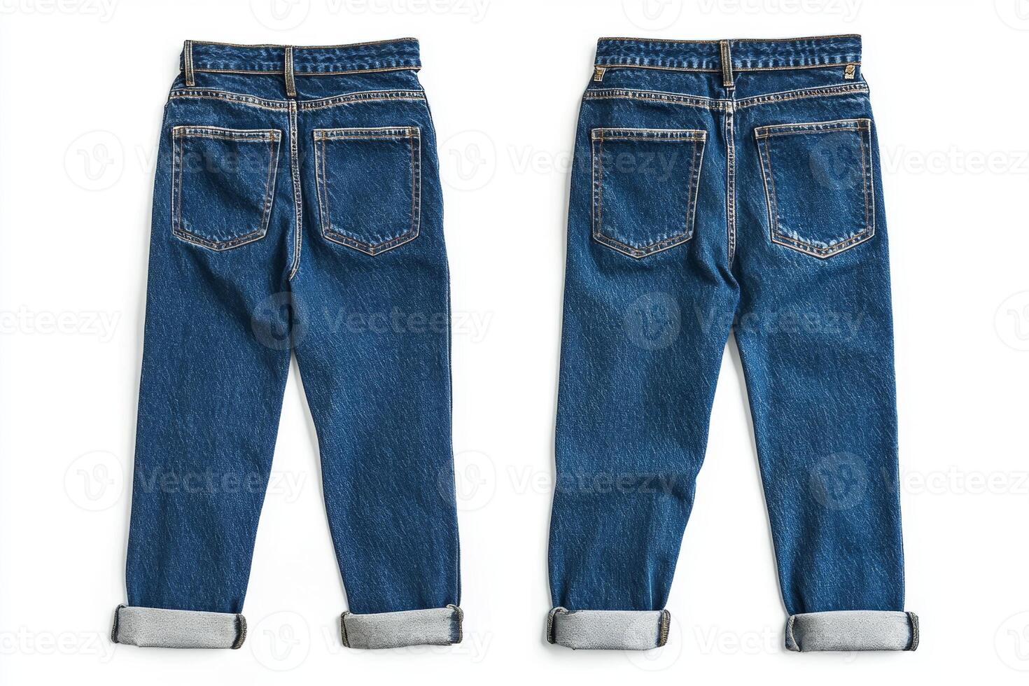 Classic blue denim jeans with rolled cuffs displayed on a white background showcasing timeless fashion and versatile style photo