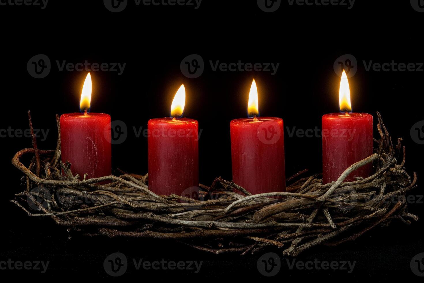 Elegant Advent wreath with four burning red candles, a festive Christmas decoration from France photo