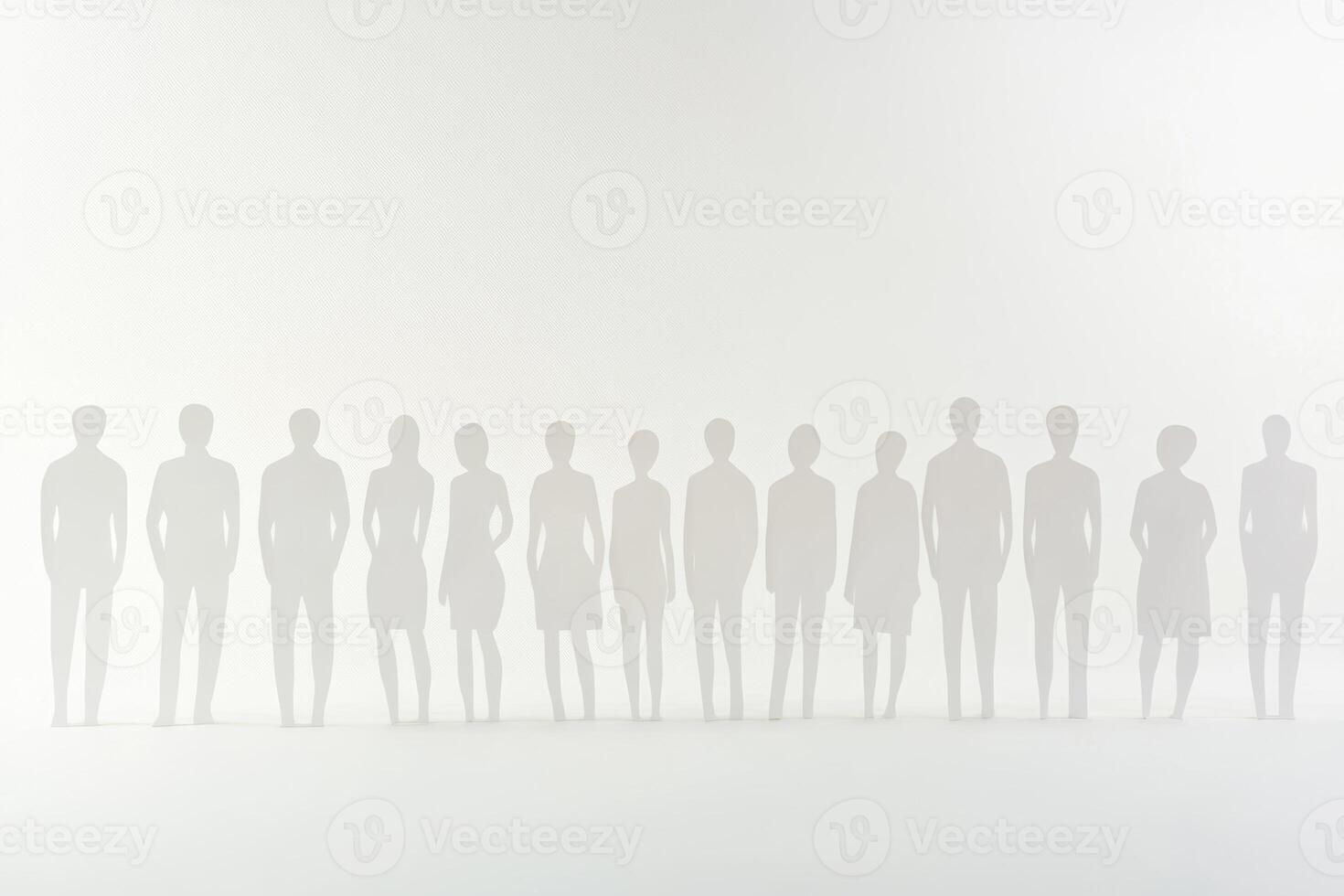 Silhouettes of diverse individuals standing in a minimalist space with soft lighting photo
