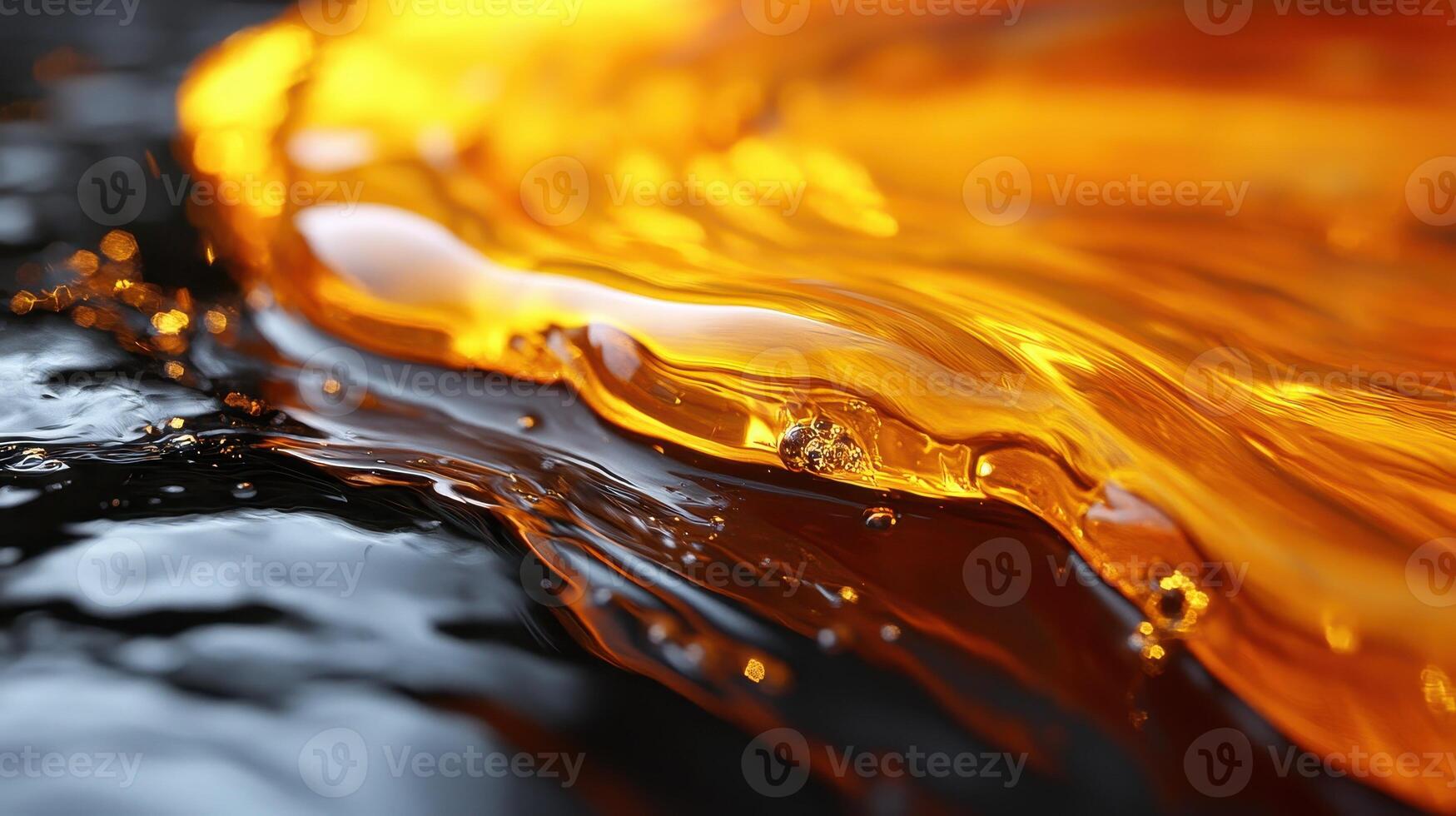 Golden liquid flowing on dark surface, abstract background, texture design photo