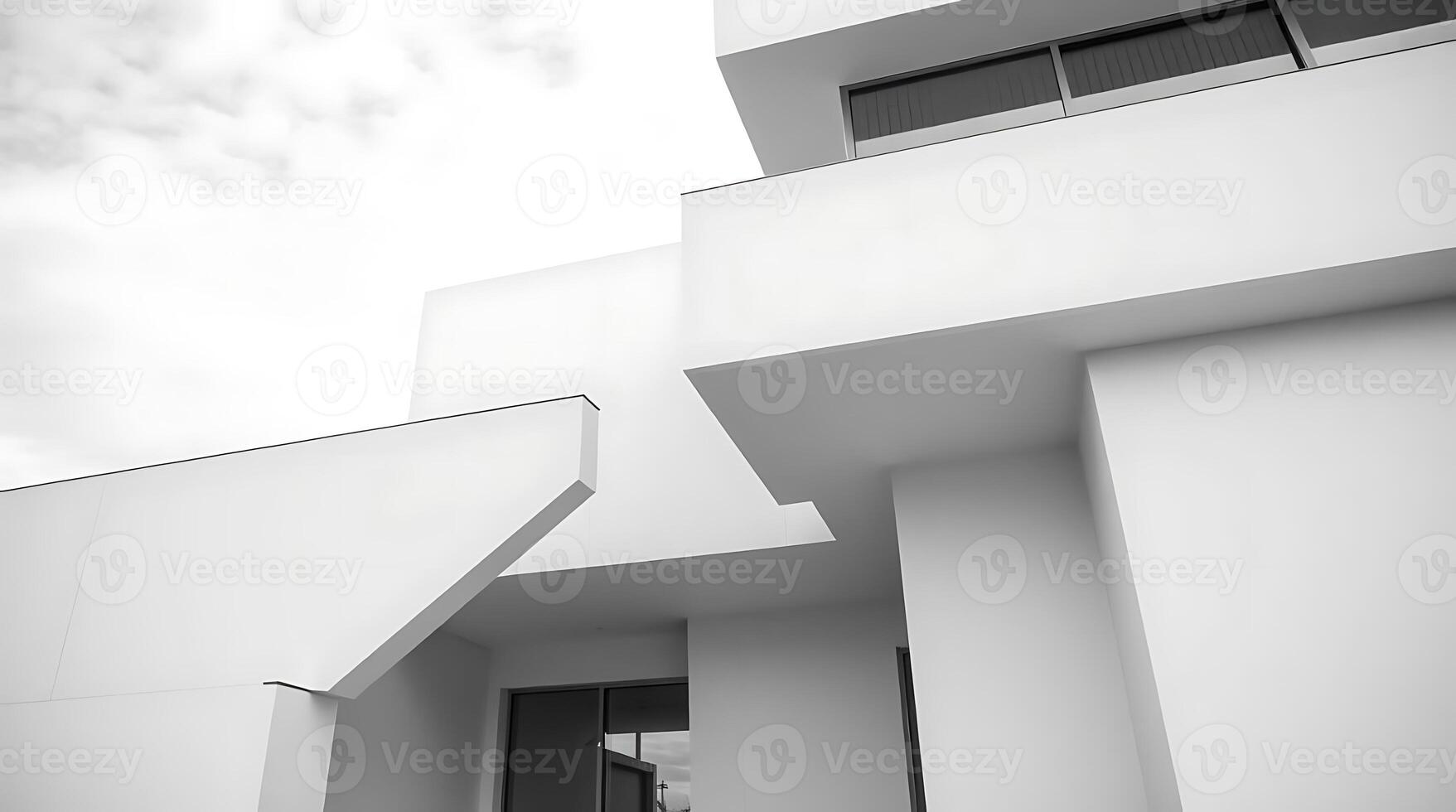 Modern minimalist architecture featuring stark white facade and sharp angles photo