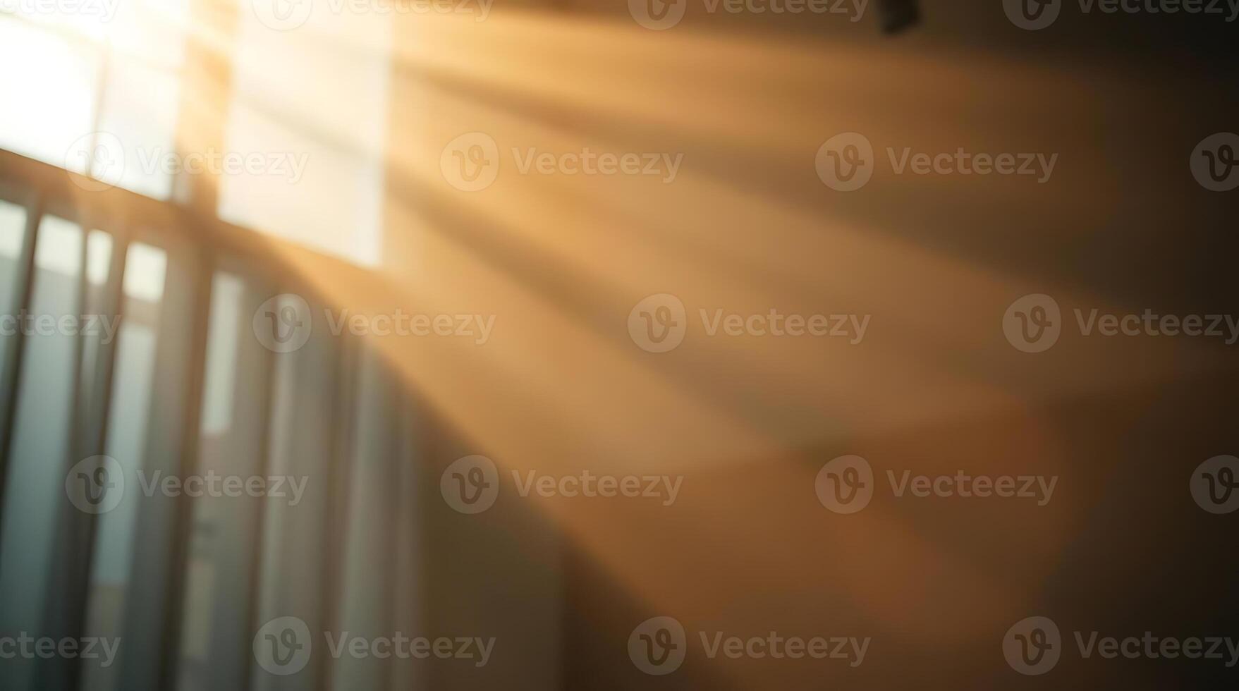 Beautiful sunbeams streaming through a window with curtains creating a warm atmosphere. photo