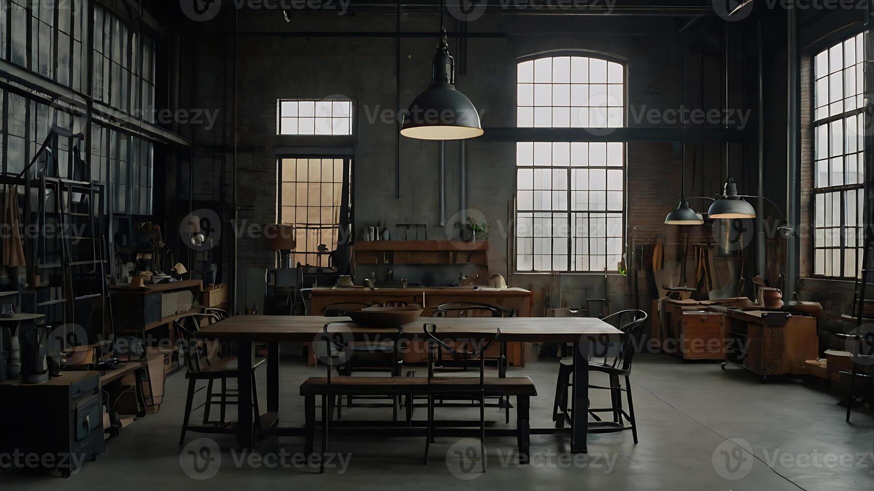 Industrial workshop interior with large dining table, windows and workshop tools photo